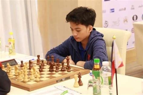 Philippine chess champion eyes Grandmaster status .